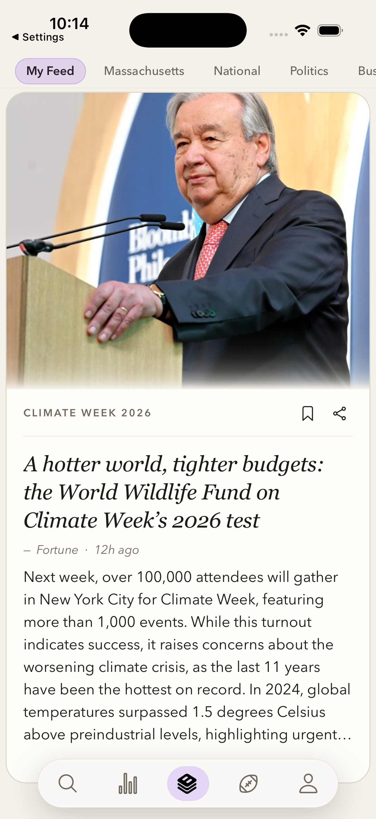 The same Briefed. news feed in light mode, with its warm paper background and floating navigation bar.